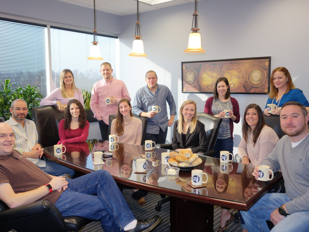 The R&J team enjoys coffee